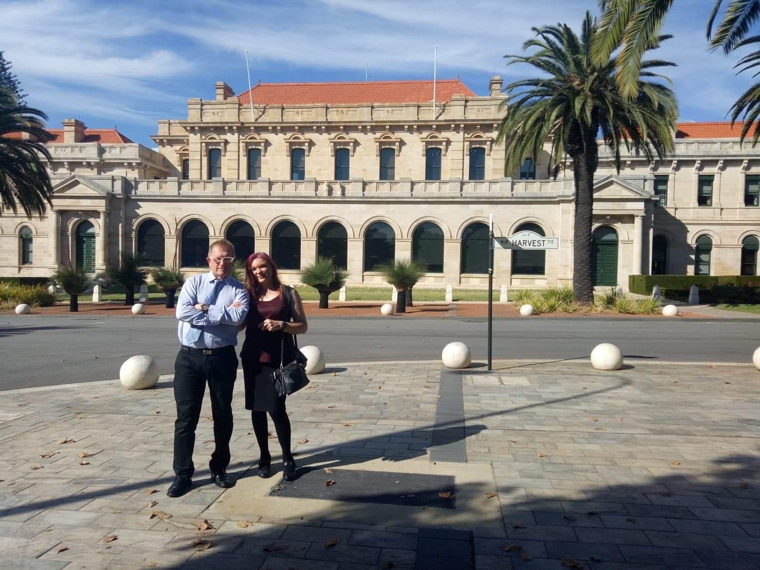 Associate Professor Sam Winter, a long time advocate for transgender equality, and Perth rock guitarist and trans advocate Jaime Page, outside the Western Australian Parliament House.